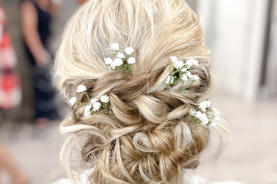 Blush Beauty wedding gallery. Close up of a wedding updo.