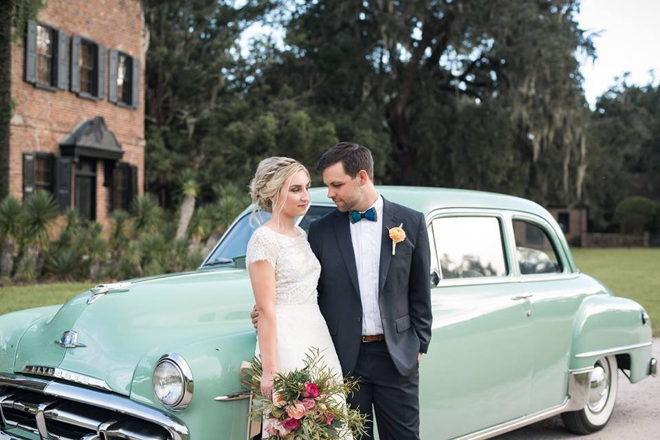 Blush Beauty wedding gallery. Bride and groom photo shoot with mint-colored classic car in the background.