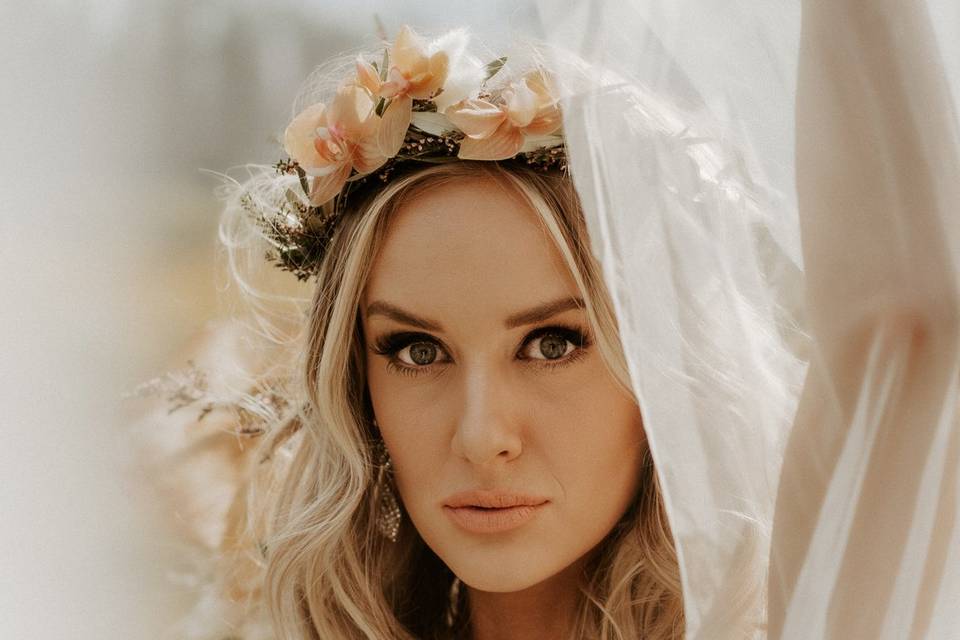Blush Beauty wedding gallery. Bride wearing veil with natural makeup.