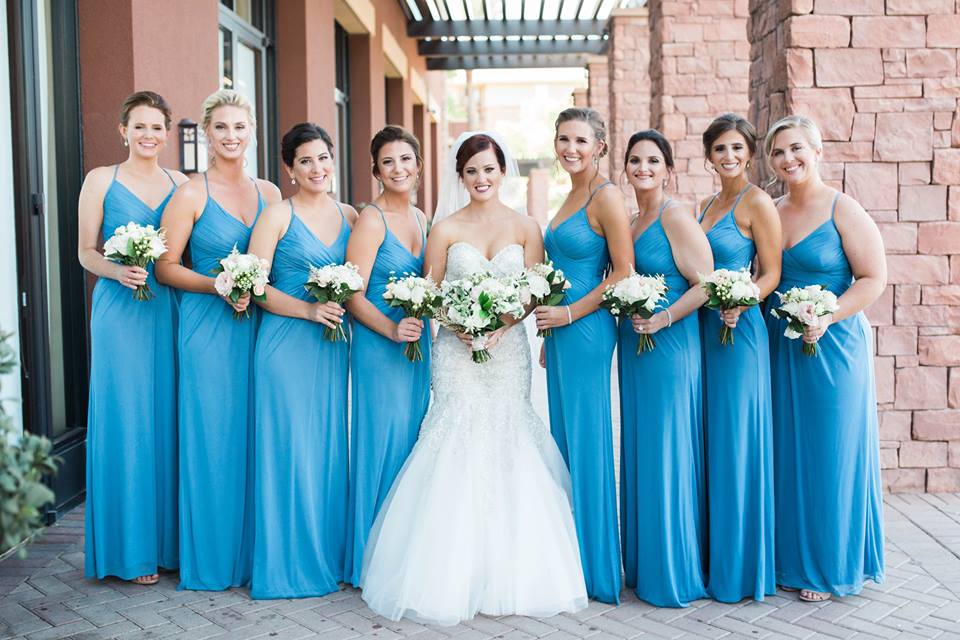 Blush Beauty wedding gallery. Group shot of bridal party. White wedding dress. Blue bridesmaids dresses.