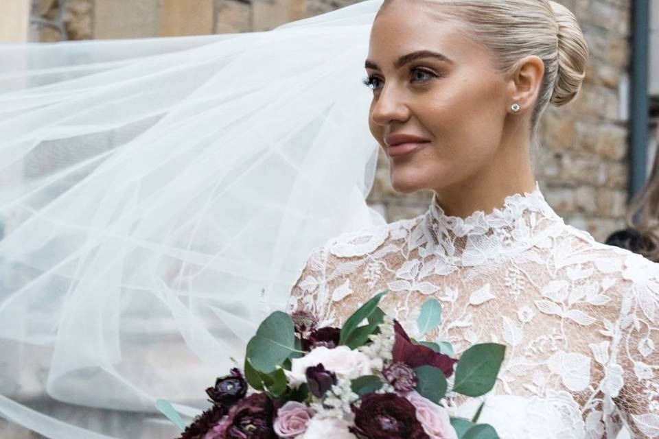 Blush Beauty wedding gallery. Close up of bride wearing veil.
